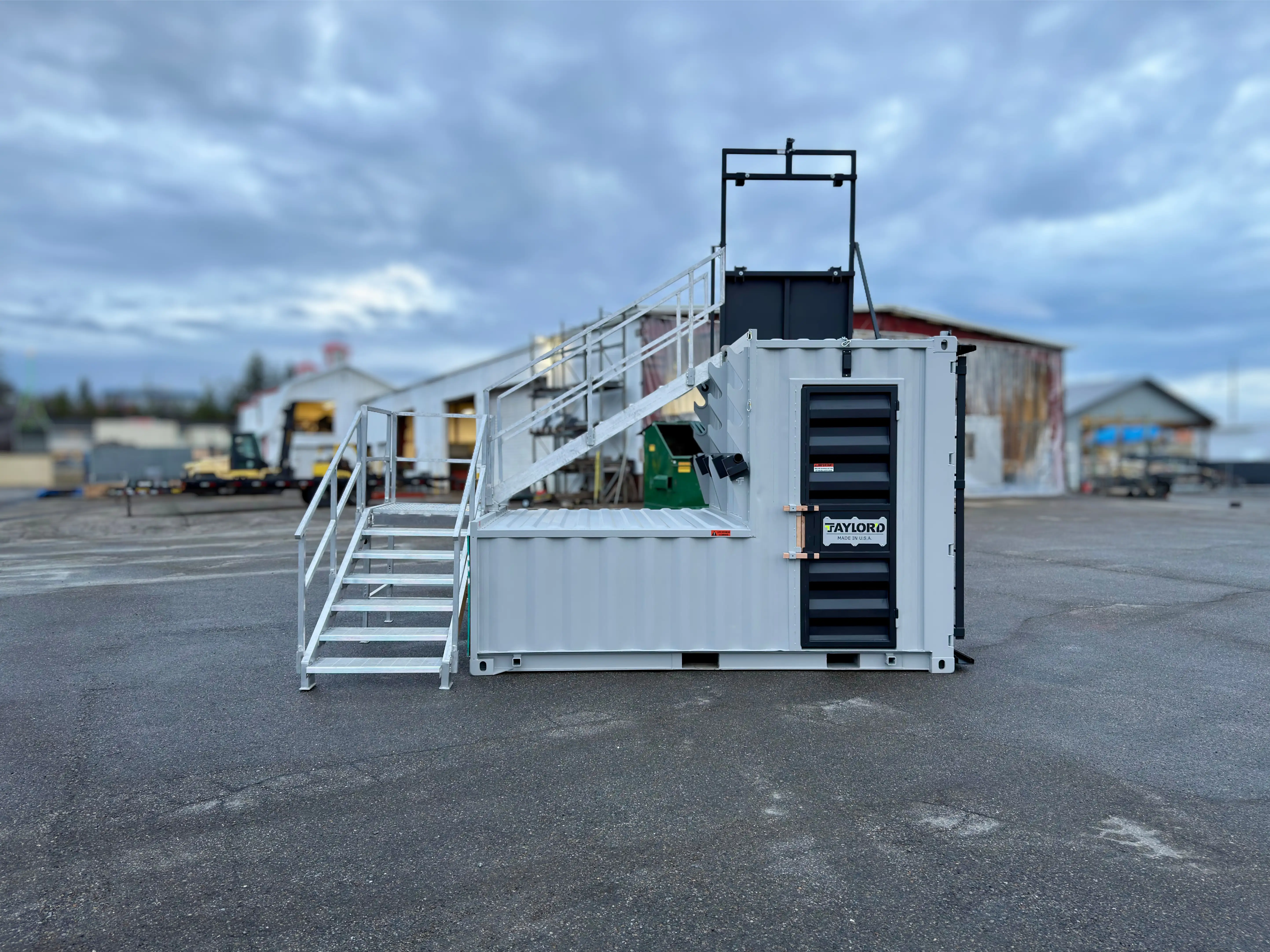 Series 12 firefighter training prop with stairs and platform set up outdoors at the Taylor'd yard in Spokane Valley