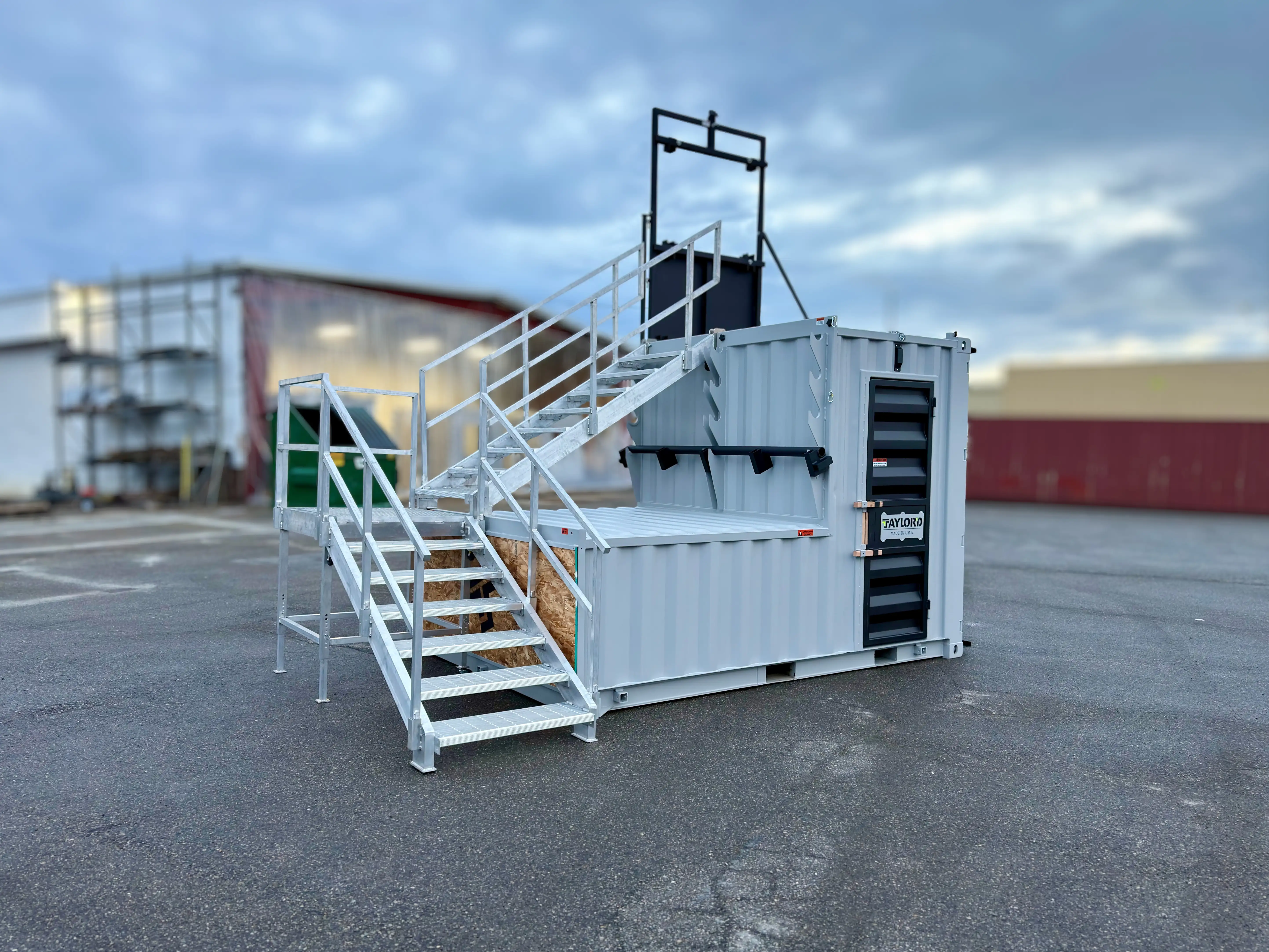 Series 12 fire training prop with the stair option staged in a training lot, showing the full stair run and landing