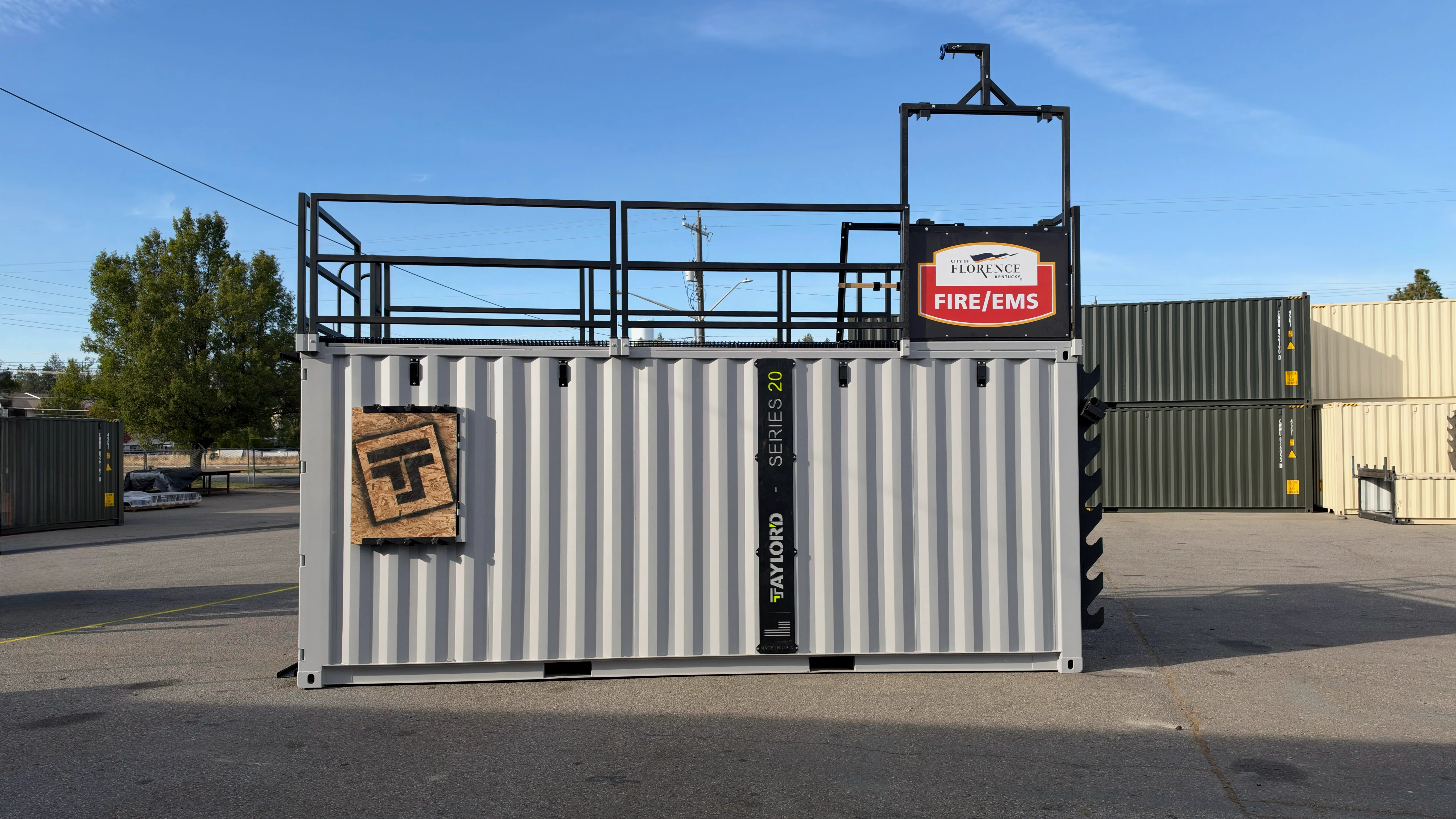 Taylor'd Series 20 firefighter training prop at Florence Fire/EMS, with rooftop railings and a training window